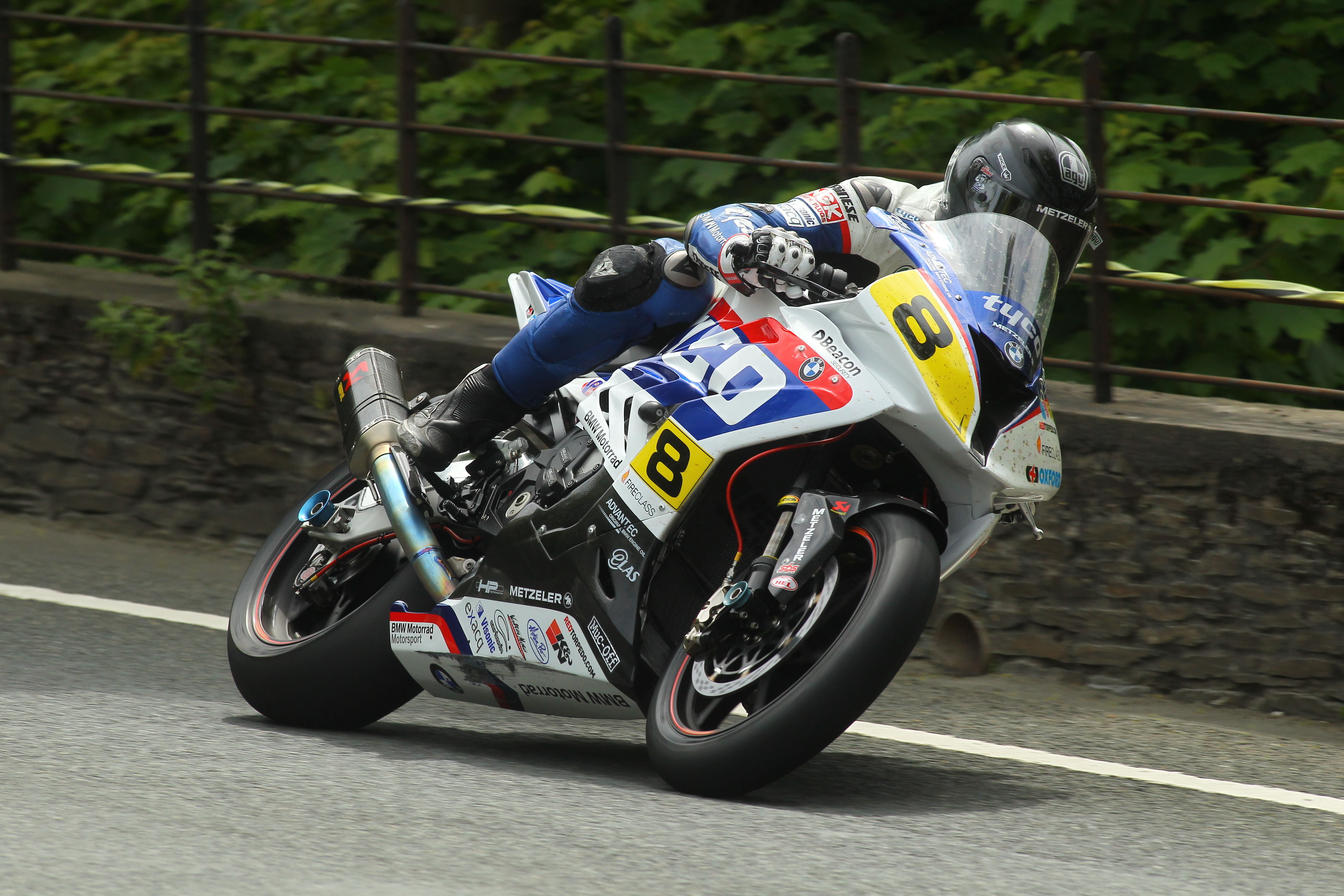 Guy en-route to his fastest ever lap at the TT [132.398mp] aboard the Tyco BMW S1000RR Superbike